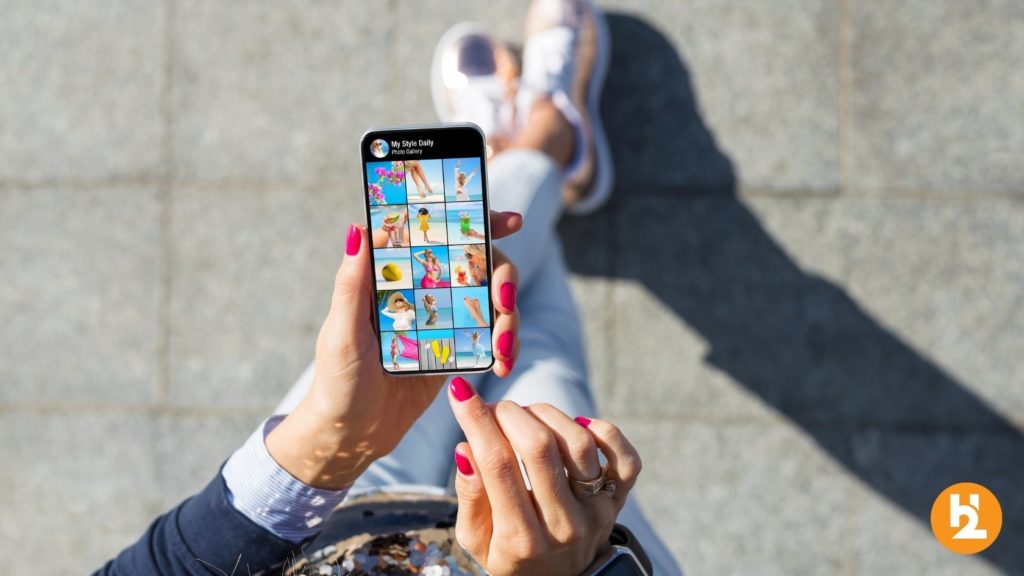 Woman on her phone using a social media application.