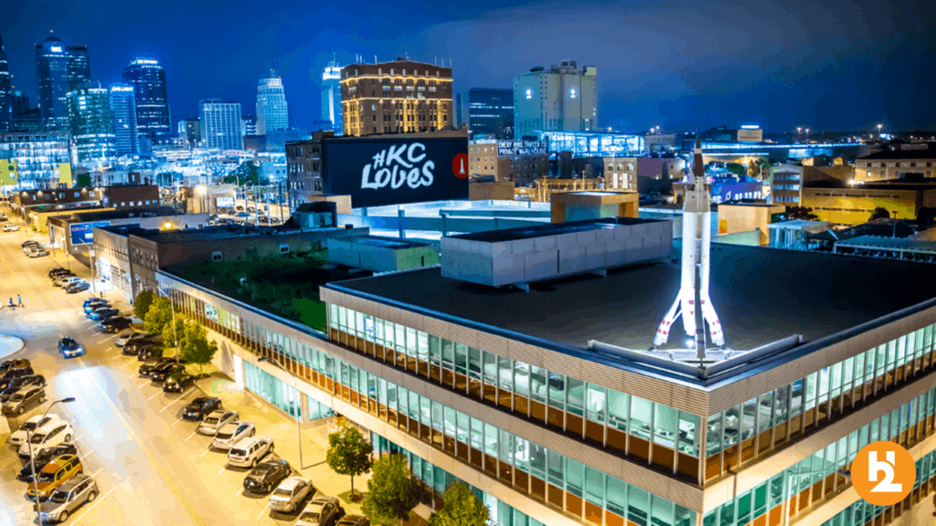 Kansas City downtown skyline and advertising billboard #KCLoves