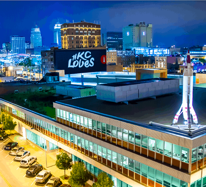 Kansas City downtown skyline and advertising billboard #KCLoves