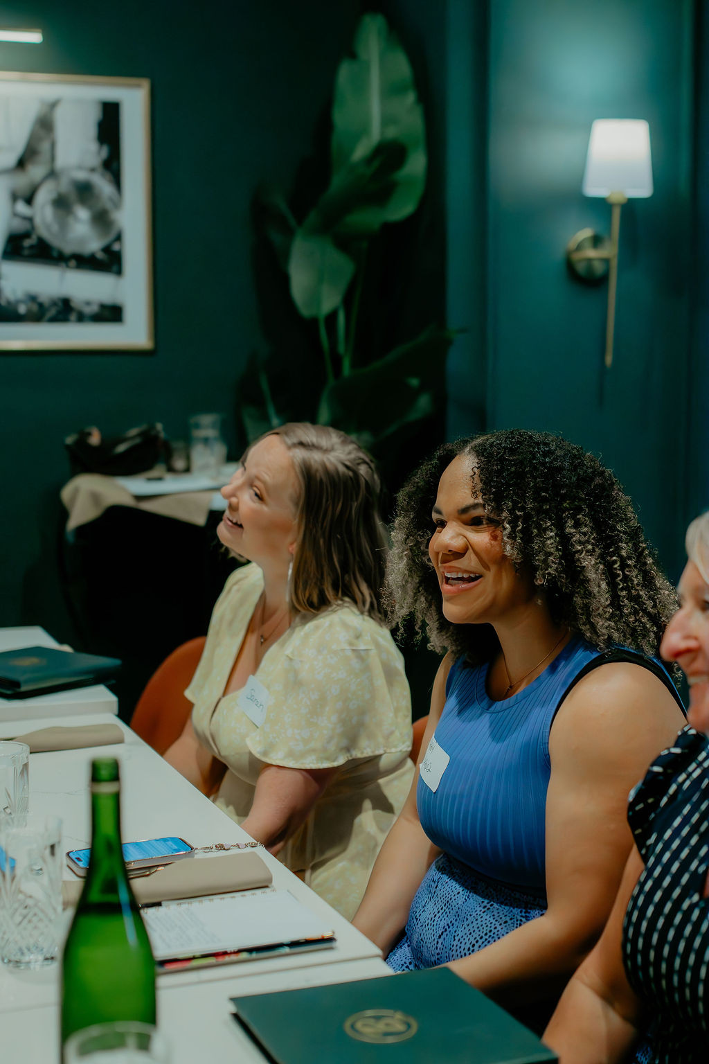 Women at the Helps2 KC Cohort networking among each other