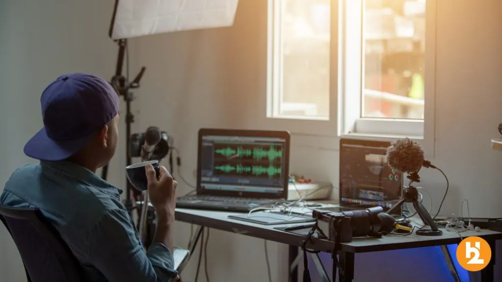 Audio Content Creator making audio content in his office.