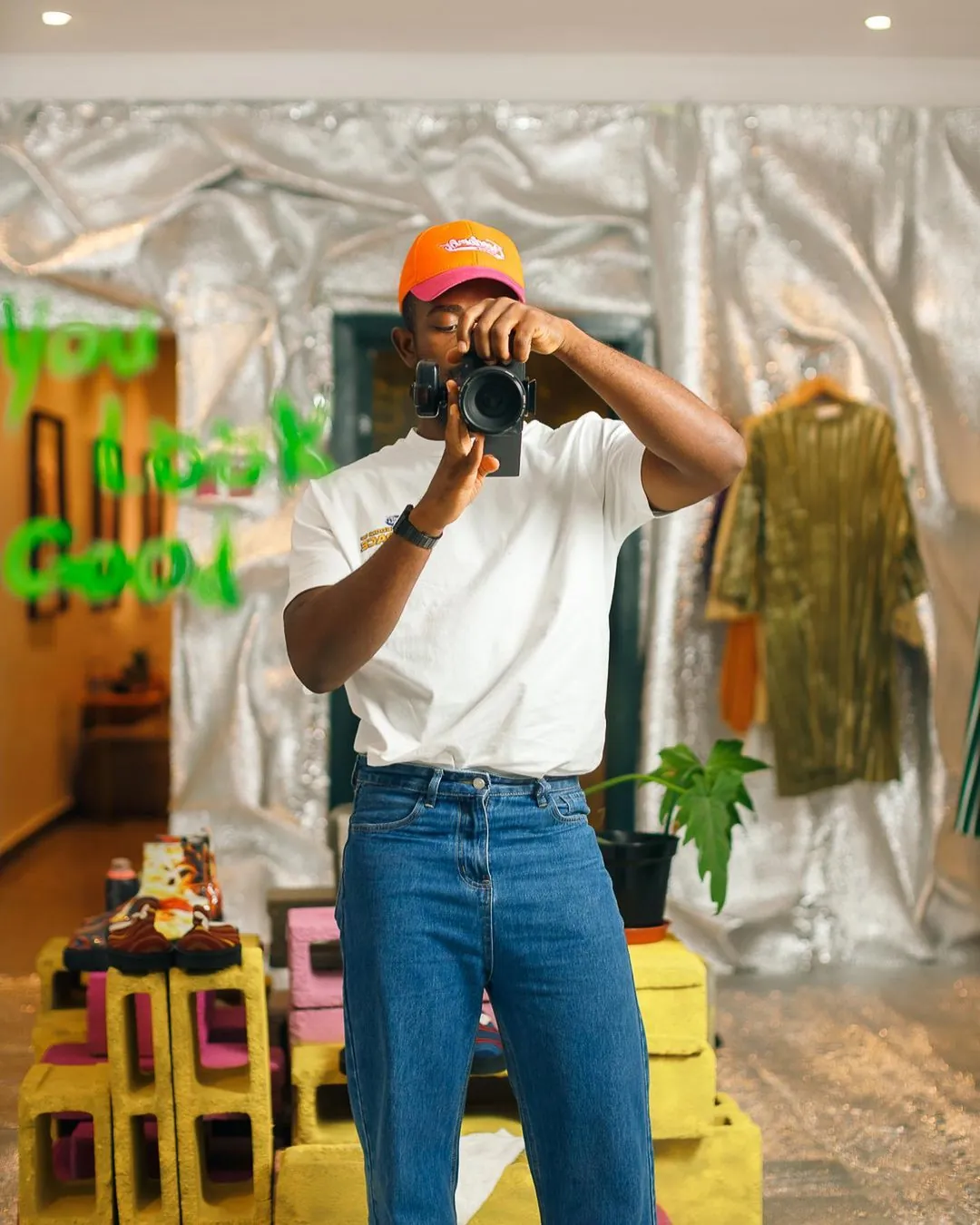 Photographer taking a photo in the mirror